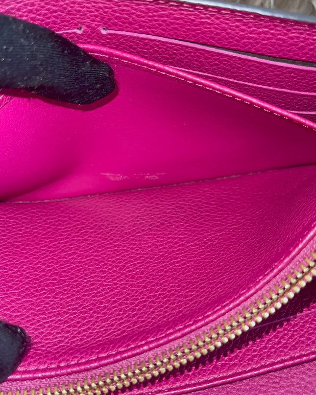 Preloved Authentic Louis Vuitton Monogram Empreinte Sarah Wallet – Fuchsia