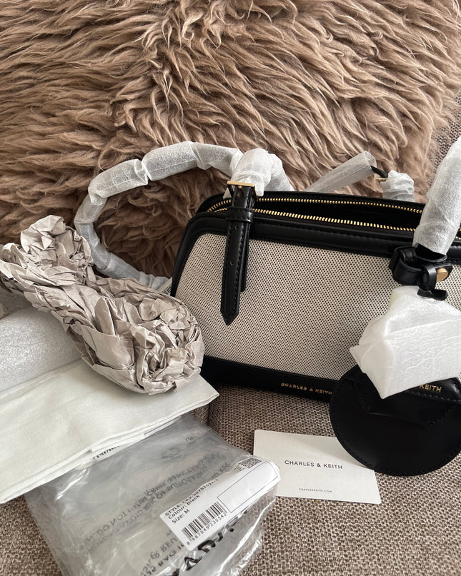 Preloved Authentic Charles & Keith Structured Boston Bag in Black White Mesh