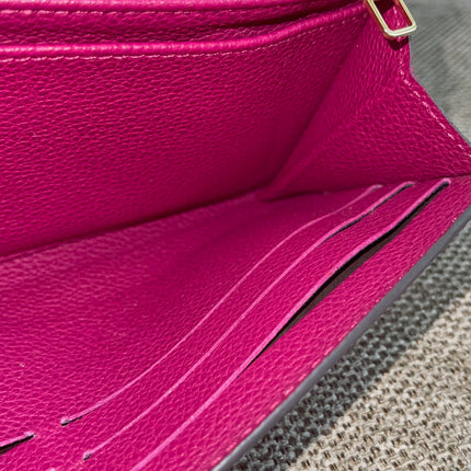 Preloved Authentic Louis Vuitton Monogram Empreinte Sarah Wallet – Fuchsia