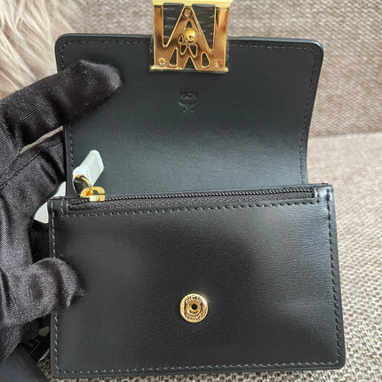 Preloved Authentic MCM Mena Trifold Wallet – Cognac Visetos