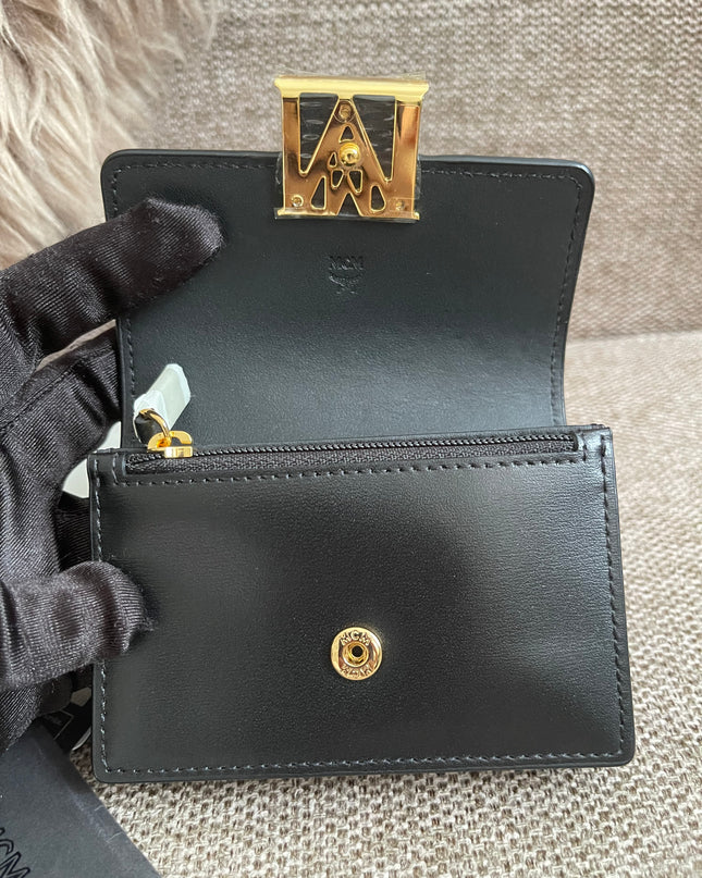 Preloved Authentic MCM Mena Trifold Wallet – Cognac Visetos
