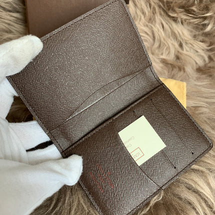 LOUIS VUITTON
Damier Ebene Canvas Pocket Organizer