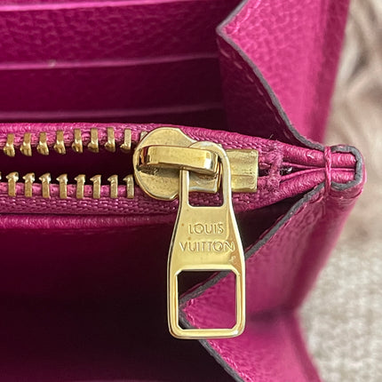 Preloved Authentic Louis Vuitton Monogram Empreinte Sarah Wallet – Fuchsia