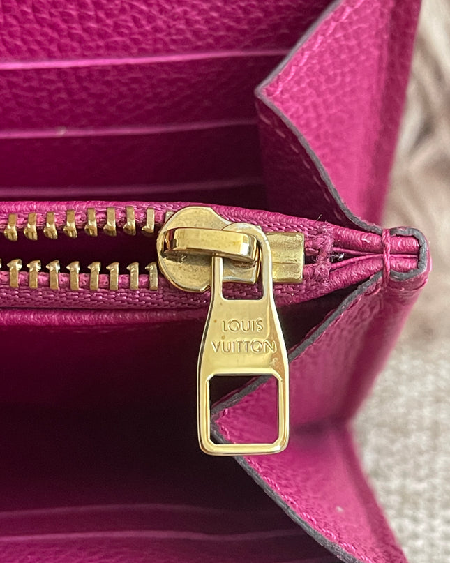 Preloved Authentic Louis Vuitton Monogram Empreinte Sarah Wallet – Fuchsia