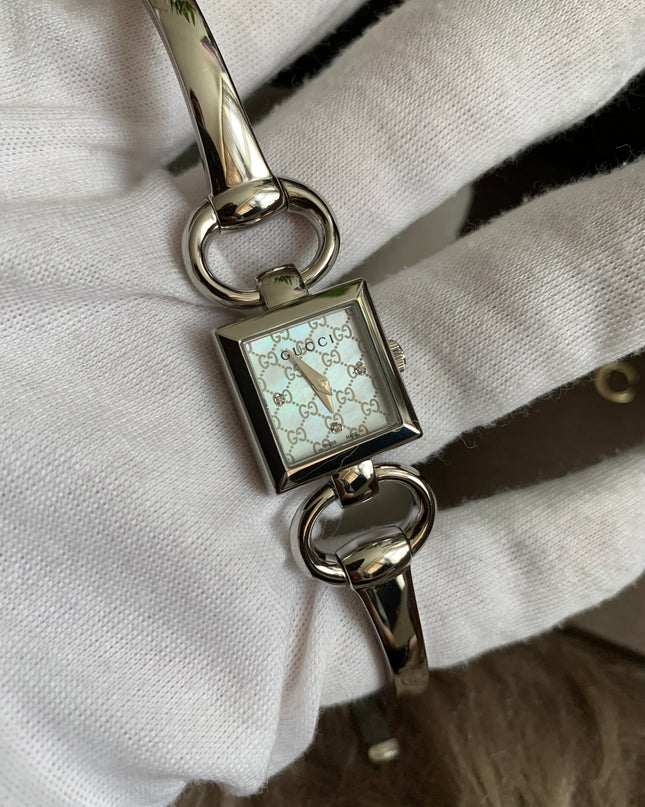 Gucci Tornavoni Women's Watch, 0.7 inch (18 mm), Quartz, White Pearl YA120517