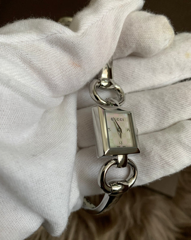 Gucci Tornavoni Women's Watch, 0.7 inch (18 mm), Quartz, White Pearl YA120517