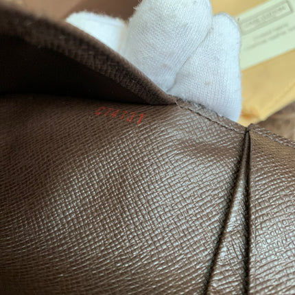 LOUIS VUITTON
Damier Ebene Canvas Pocket Organizer