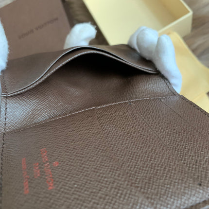 LOUIS VUITTON
Damier Ebene Canvas Pocket Organizer