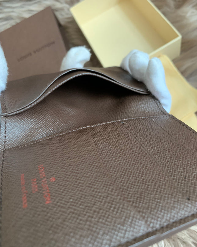 LOUIS VUITTON
Damier Ebene Canvas Pocket Organizer