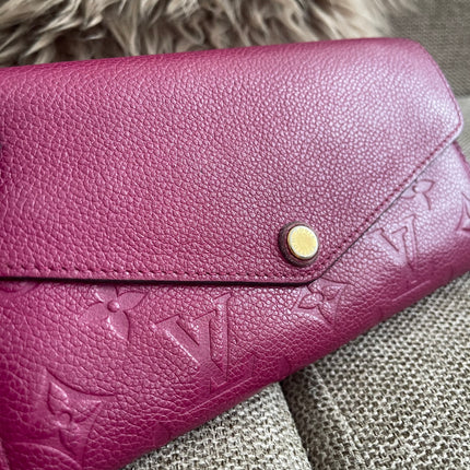 Preloved Authentic Louis Vuitton Monogram Empreinte Sarah Wallet – Fuchsia
