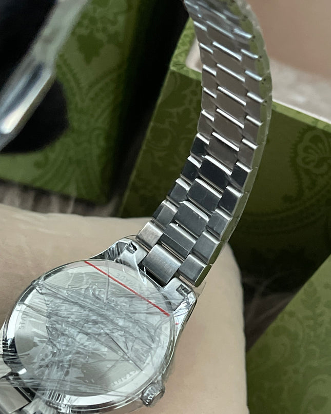 Preloved Authentic unused Gucci G-Timeless bee 32mm stainless steel watch