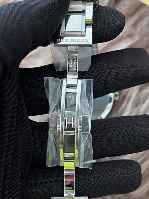 Preloved Authentic Rank N Burberry The City BU9001 stainless steel watch with a black dial.