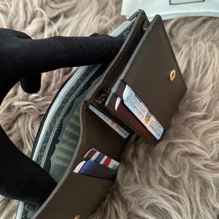 Preloved Authentic GG Supreme Gucci bifold wallet