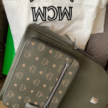 Preloved MCM Stark Leather Backpack in SEA TURTLE