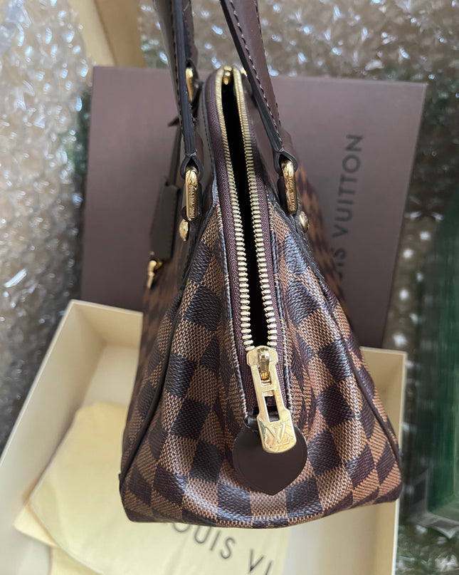 Preloved Louis Vuitton Pre-Owned
2012 Verona PM shoulder bag w/provided strap