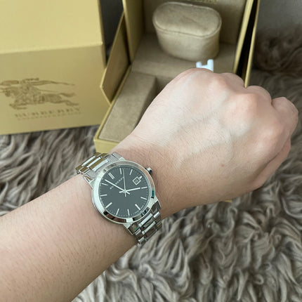 Preloved Authentic Rank N Burberry The City BU9001 stainless steel watch with a black dial.