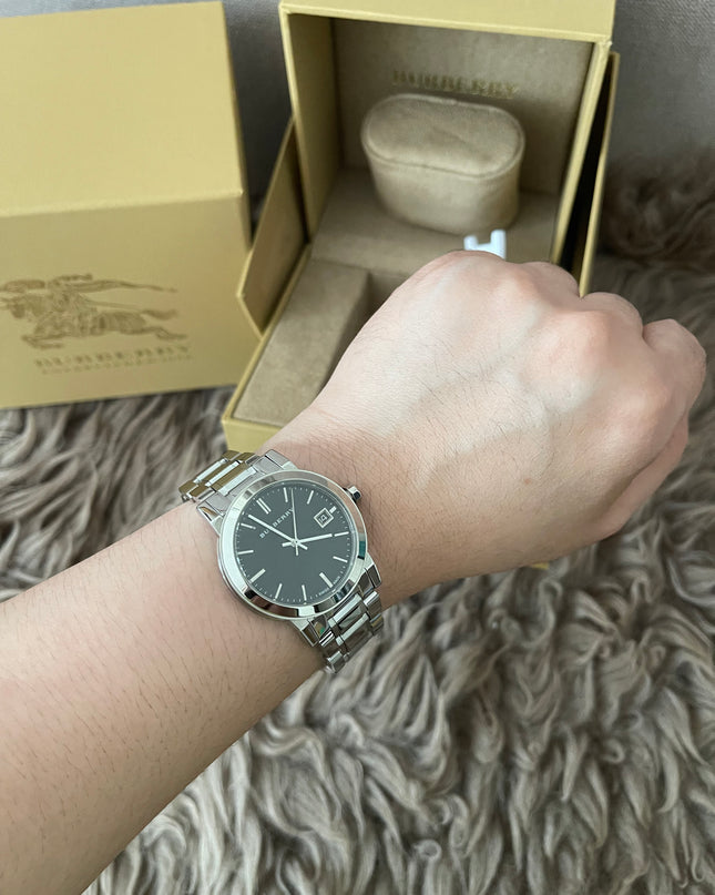 Preloved Authentic Rank N Burberry The City BU9001 stainless steel watch with a black dial.