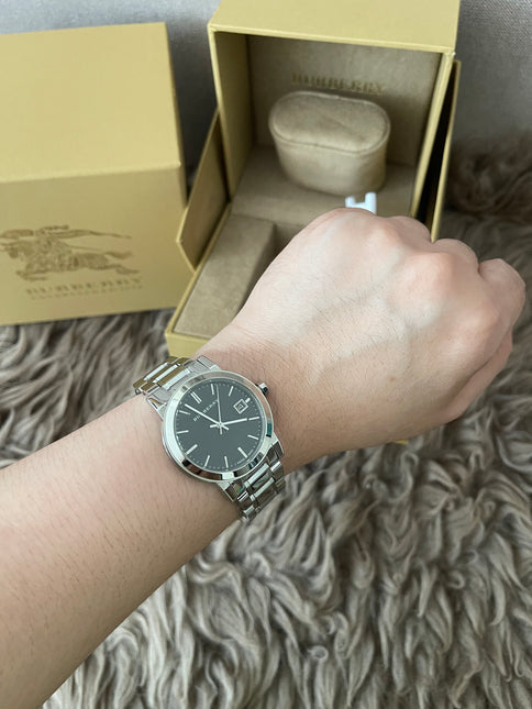 Preloved Authentic Rank N Burberry The City BU9001 stainless steel watch with a black dial.