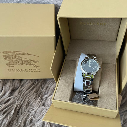 Preloved Authentic Rank N Burberry The City BU9001 stainless steel watch with a black dial.