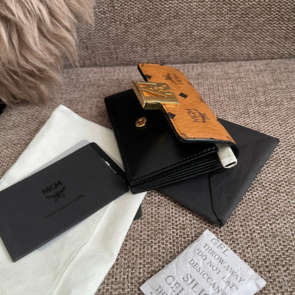 Preloved Authentic MCM Mena Trifold Wallet – Cognac Visetos