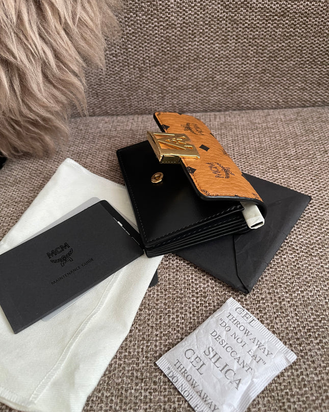 Preloved Authentic MCM Mena Trifold Wallet – Cognac Visetos