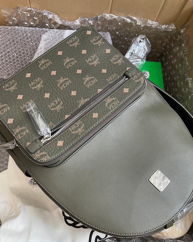 Preloved MCM Stark Leather Backpack in SEA TURTLE