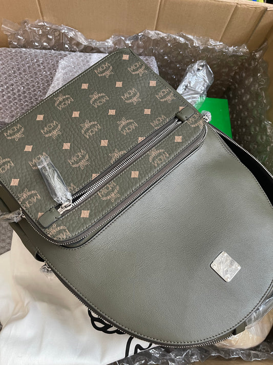 Preloved MCM Stark Leather Backpack in SEA TURTLE