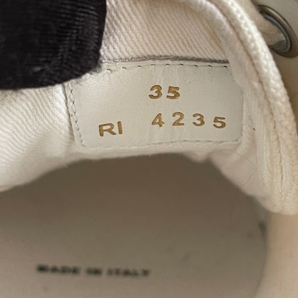 Preloved Authentic Celine Alan Sneaker with Triomphe in Canvas Off-White