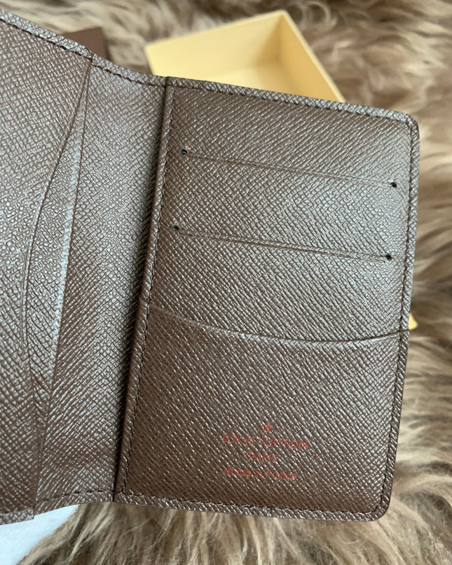 LOUIS VUITTON
Damier Ebene Canvas Pocket Organizer