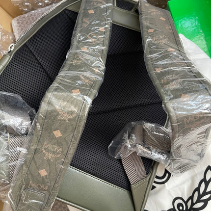 Preloved MCM Stark Leather Backpack in SEA TURTLE