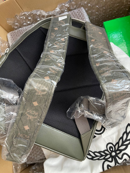 Preloved MCM Stark Leather Backpack in SEA TURTLE