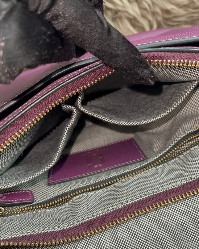 Preloved Authentic Marc Jacobs Interlock Saddle Bag in Plum