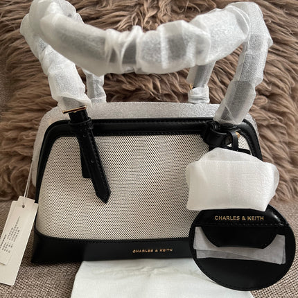 Preloved Authentic Charles & Keith Structured Boston Bag in Black White Mesh