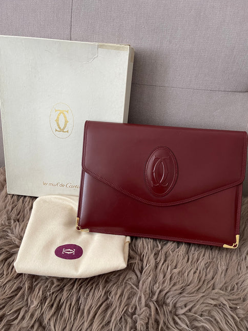 Preloved Authentic Cartier Must de Cartier Burgundy Leather Clutch