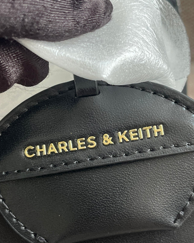 Preloved Authentic Charles & Keith Structured Boston Bag in Black White Mesh