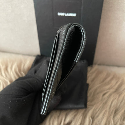 Preloved Authentic SAINT LAURENT Fragments zipped card case with flap