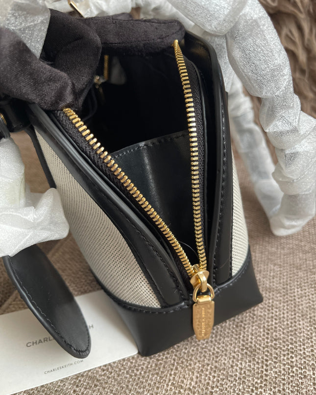 Preloved Authentic Charles & Keith Structured Boston Bag in Black White Mesh