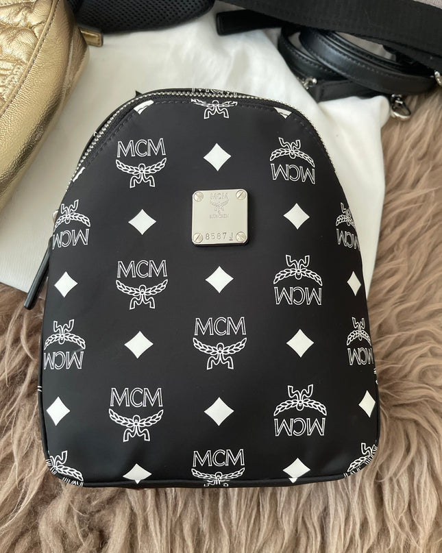 Preloved Authentic MCM Trey Mixed Media Triple-Pouch Convertible Sling