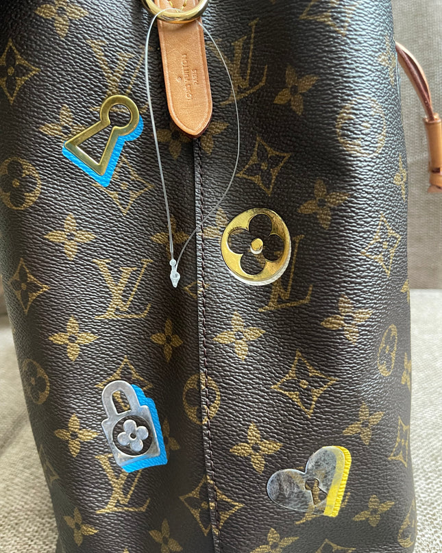 Preloved Authentic Louis Vuitton NéoNoé BB — Monogram Love Lock (Limited Edition)