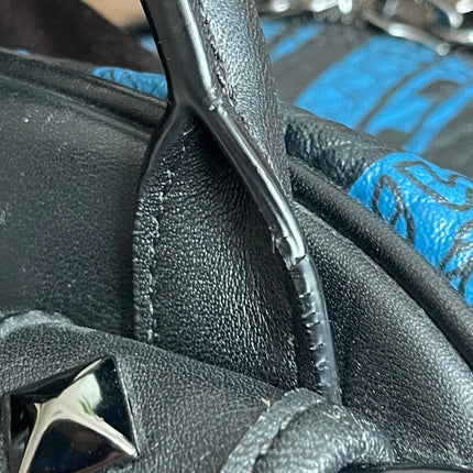Preloved Authentic MCM Stark Backpack in Blue Black Visetos