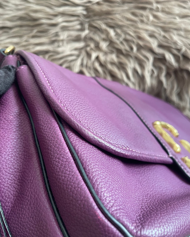 Preloved Authentic Marc Jacobs Interlock Saddle Bag in Plum