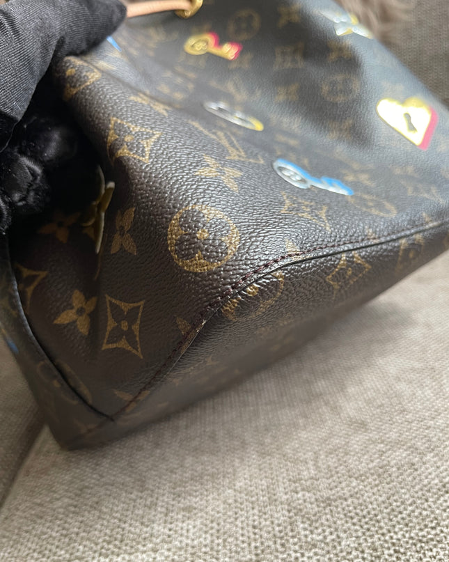 Preloved Authentic Louis Vuitton NéoNoé BB — Monogram Love Lock (Limited Edition)