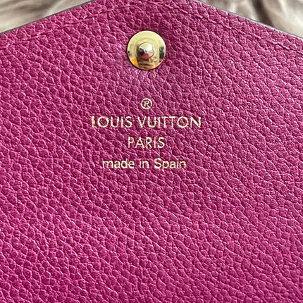 Preloved Authentic Louis Vuitton Monogram Empreinte Sarah Wallet – Fuchsia