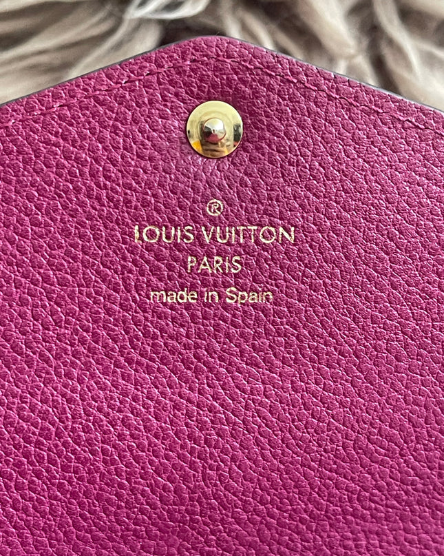 Preloved Authentic Louis Vuitton Monogram Empreinte Sarah Wallet – Fuchsia