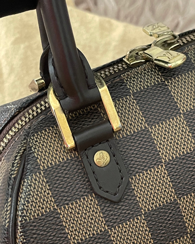 Preloved Authentic Slightly UsedLouis Vuitton Ribera Mini with strap