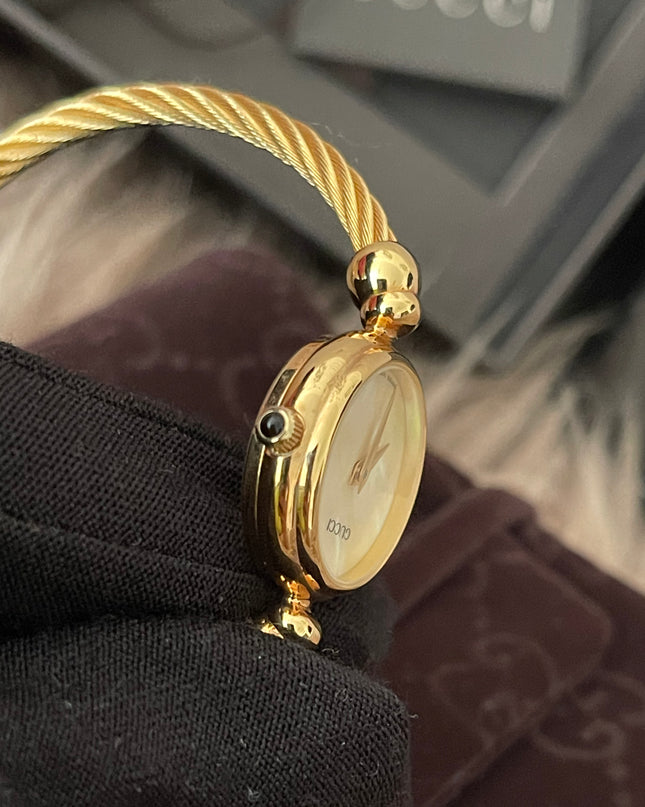 Preloved Authentic Gucci Ladies Bangle Gold Tone MOP Dial 15.5cm