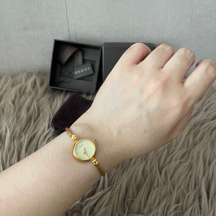 Preloved Authentic Gucci Ladies Bangle Gold Tone MOP Dial 15.5cm