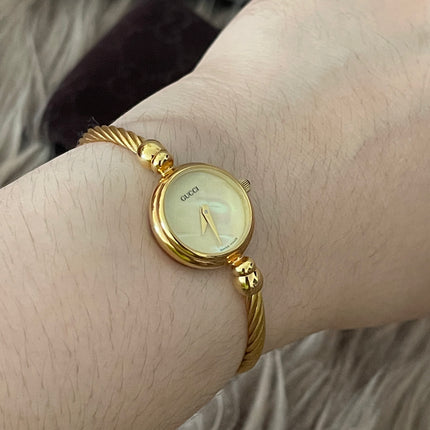 Preloved Authentic Gucci Ladies Bangle Gold Tone MOP Dial 15.5cm