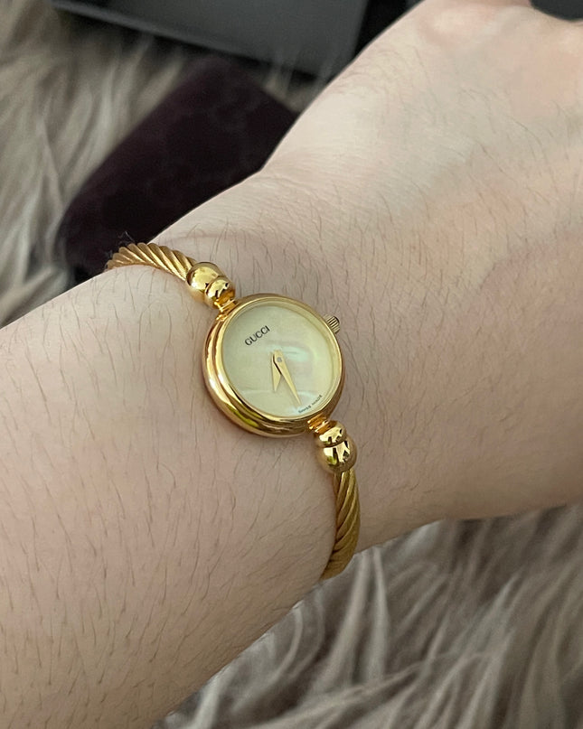 Preloved Authentic Gucci Ladies Bangle Gold Tone MOP Dial 15.5cm