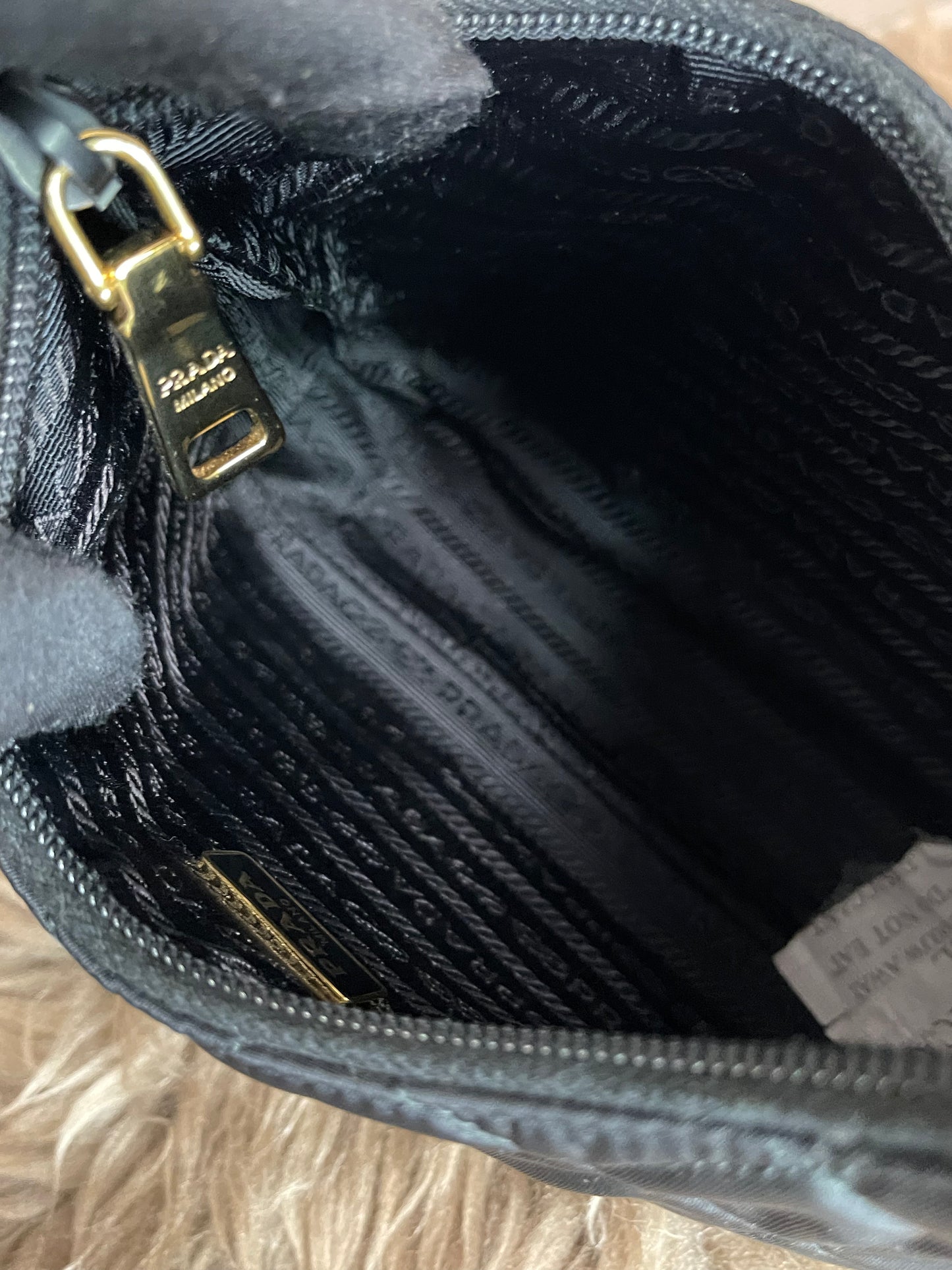 BIG DROP!! Preloved Prada Re-Edition Quilted Nylon Bag – Black
